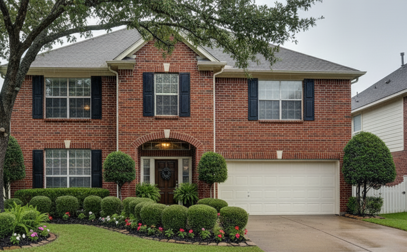 Houston home with brick siding and landscaped yard, representing a well-maintained property ready for inspection