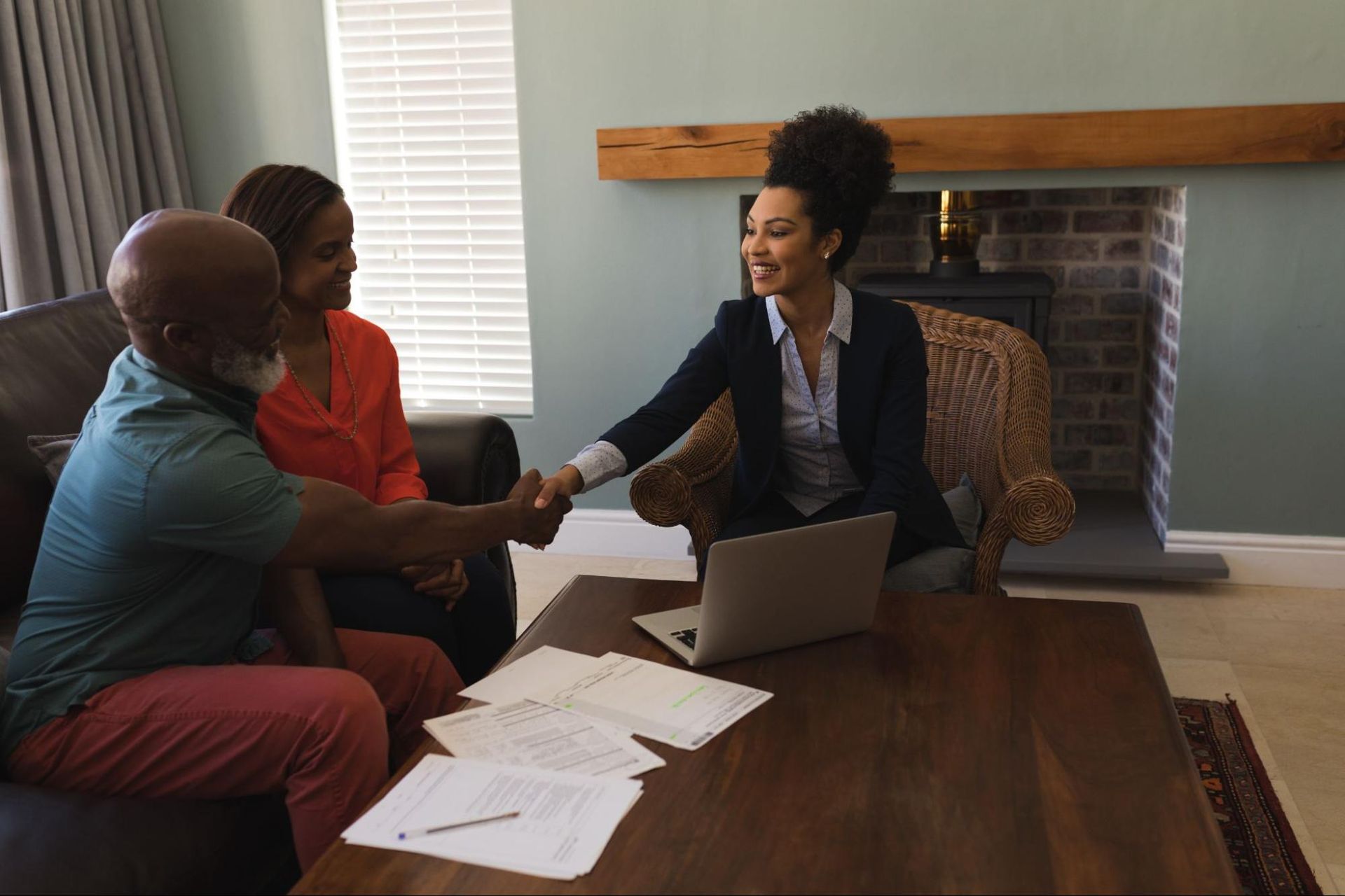 Home inspector meeting with clients to discuss home inspection details and coverage.