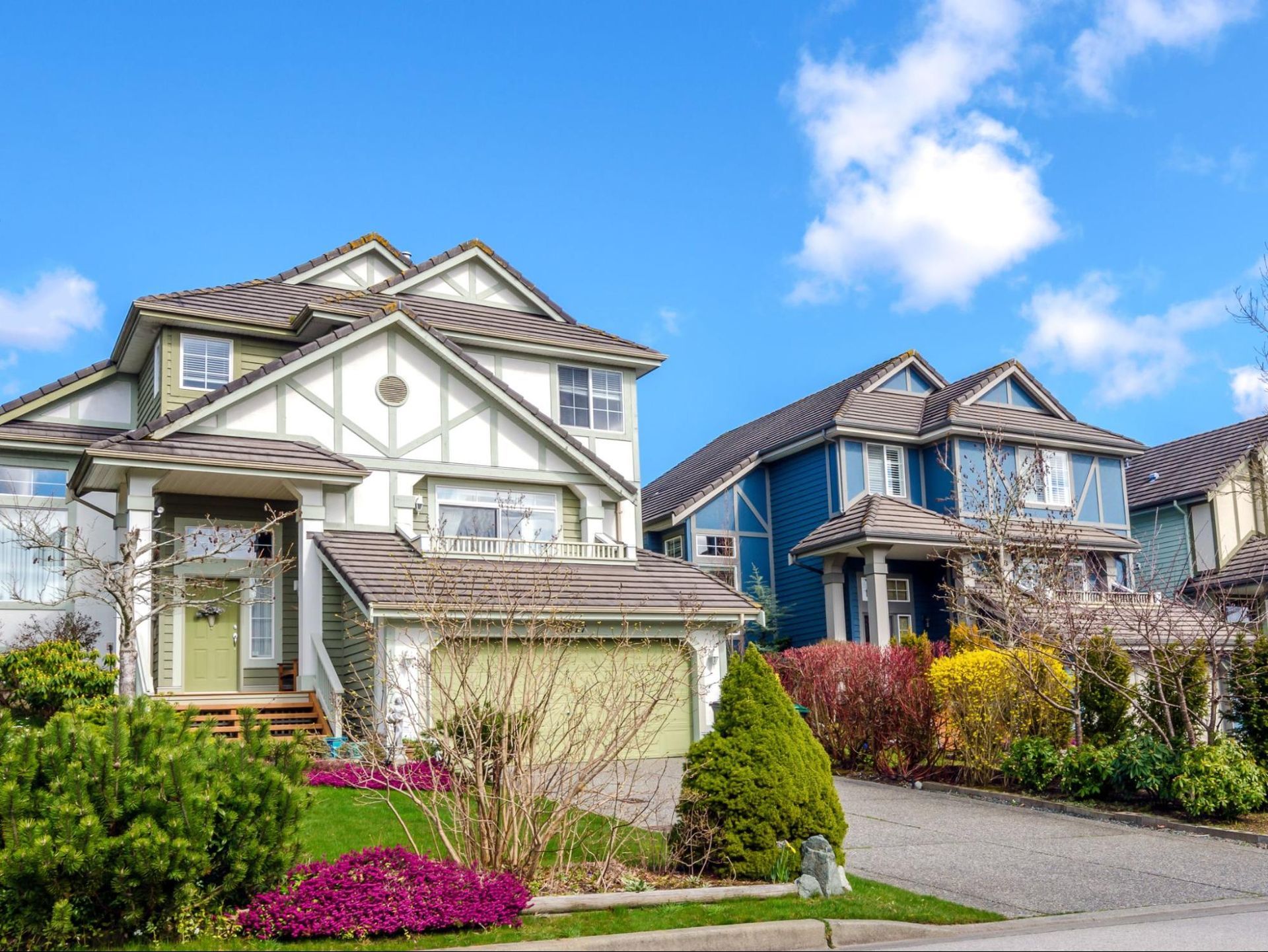  houses with landscaping, symbolizing energy checks for first time buyers in Humble