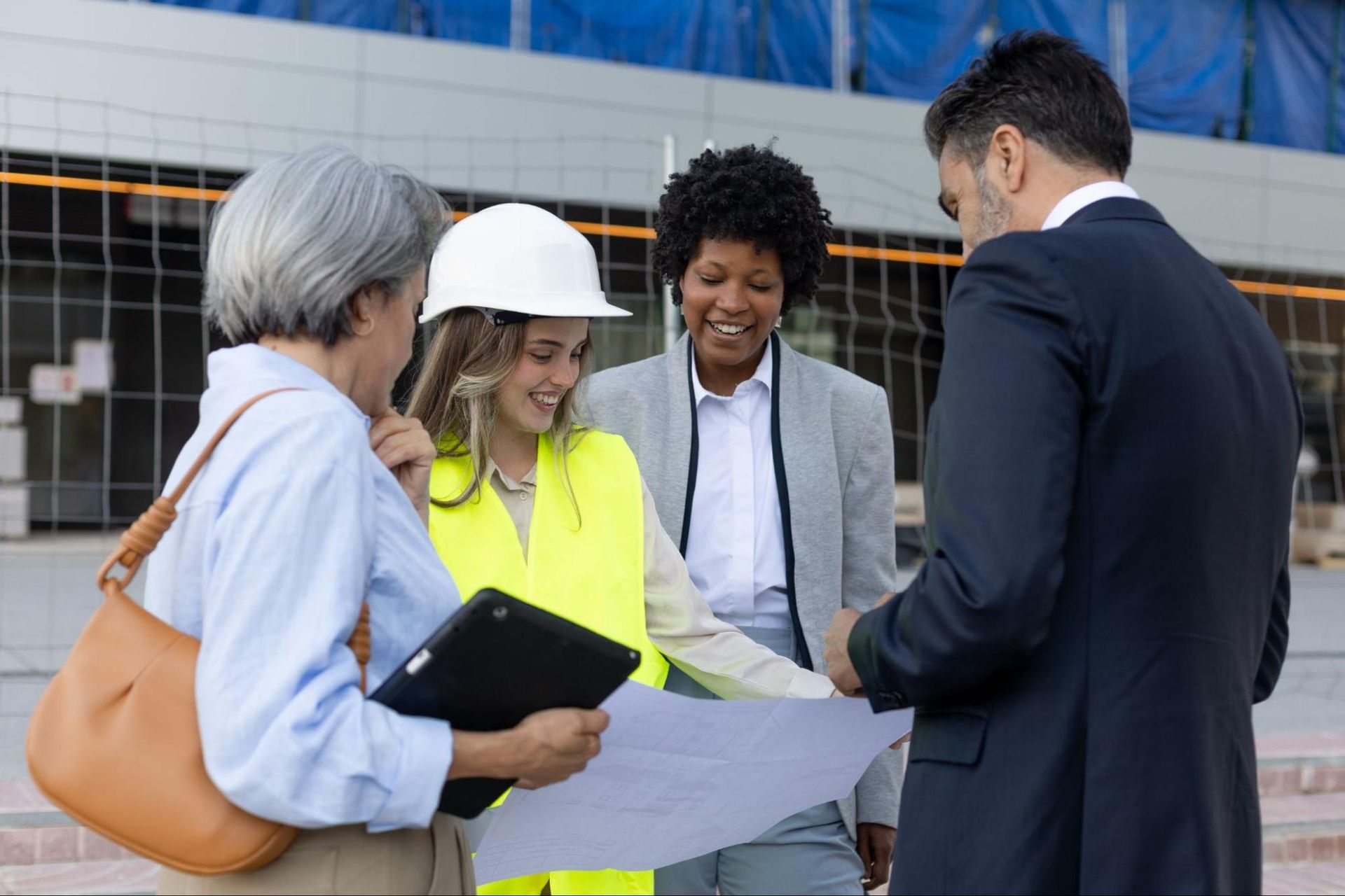 people looking at building plan