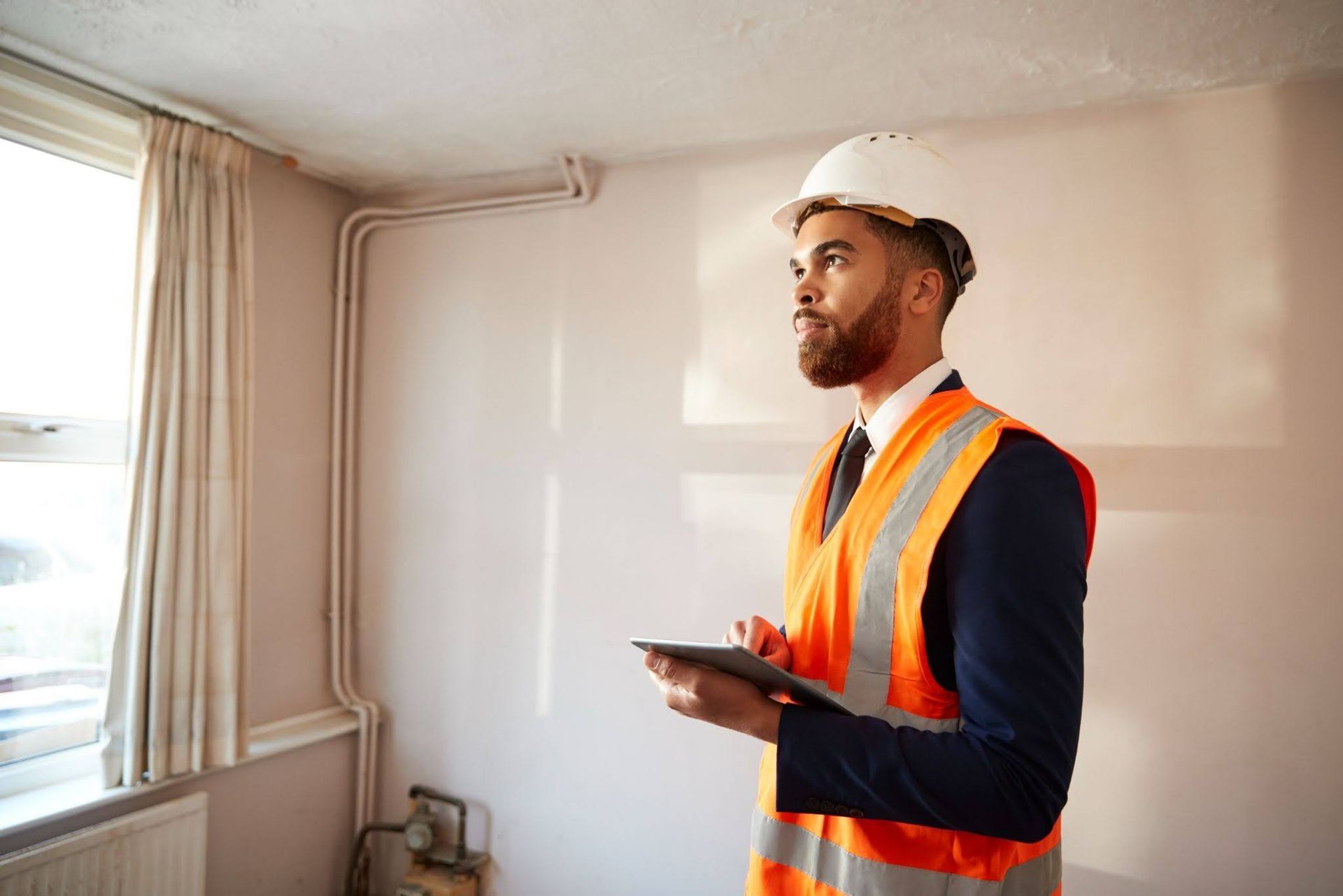 home inspector at work representing Home Inspection Cleveland TX