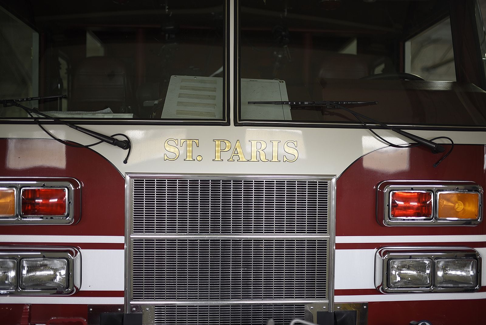 Fire truck front view, maroon and white with 