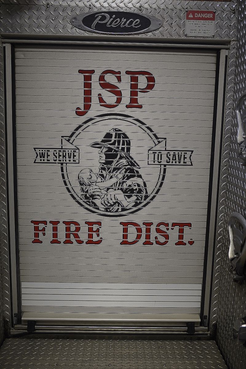 Roll-up door on a fire truck. 