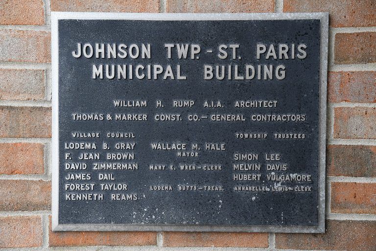 Plaque: Johnson Township-St. Paris Municipal Building, names of architect, contractors, and village council members.