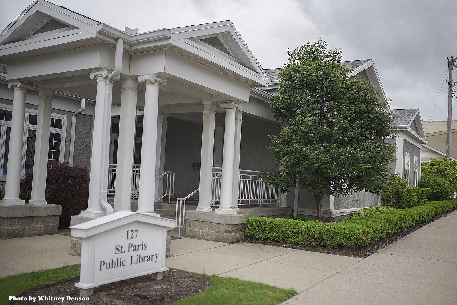 White building with columns,