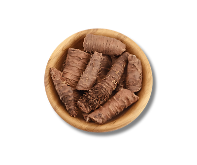 A wooden bowl filled with chocolate shavings on a white background