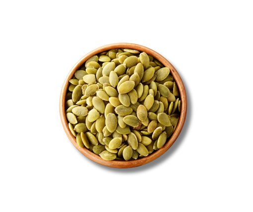 A wooden bowl filled with pumpkin seeds on a white background.