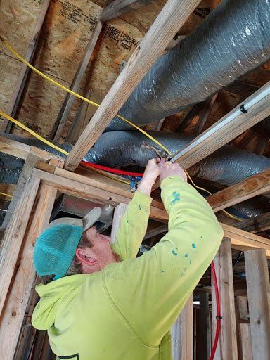 Richter Employee fixing Plumbing Issue