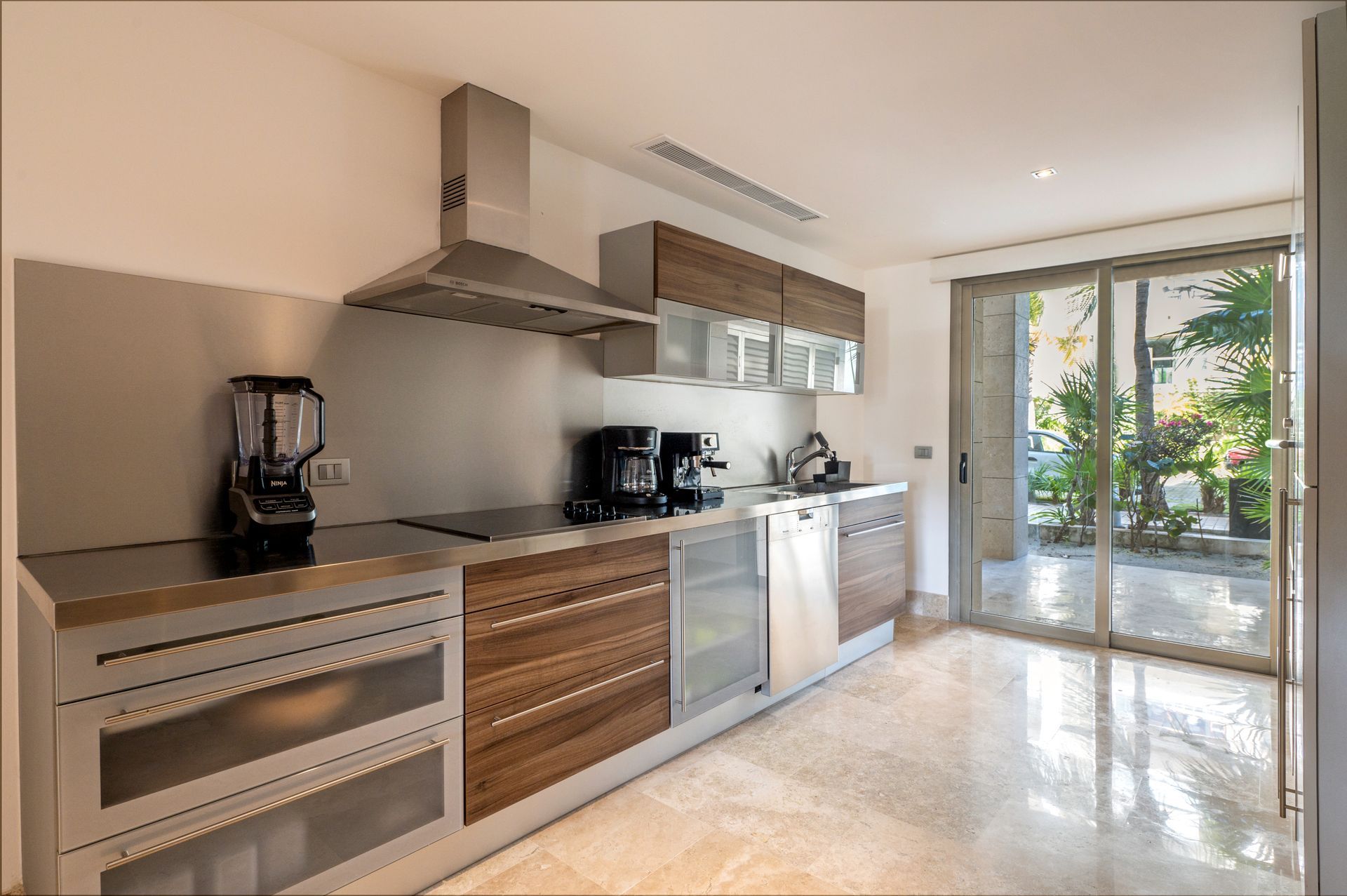 Full size equiped kitchen  with espresso machine  and ninja blender