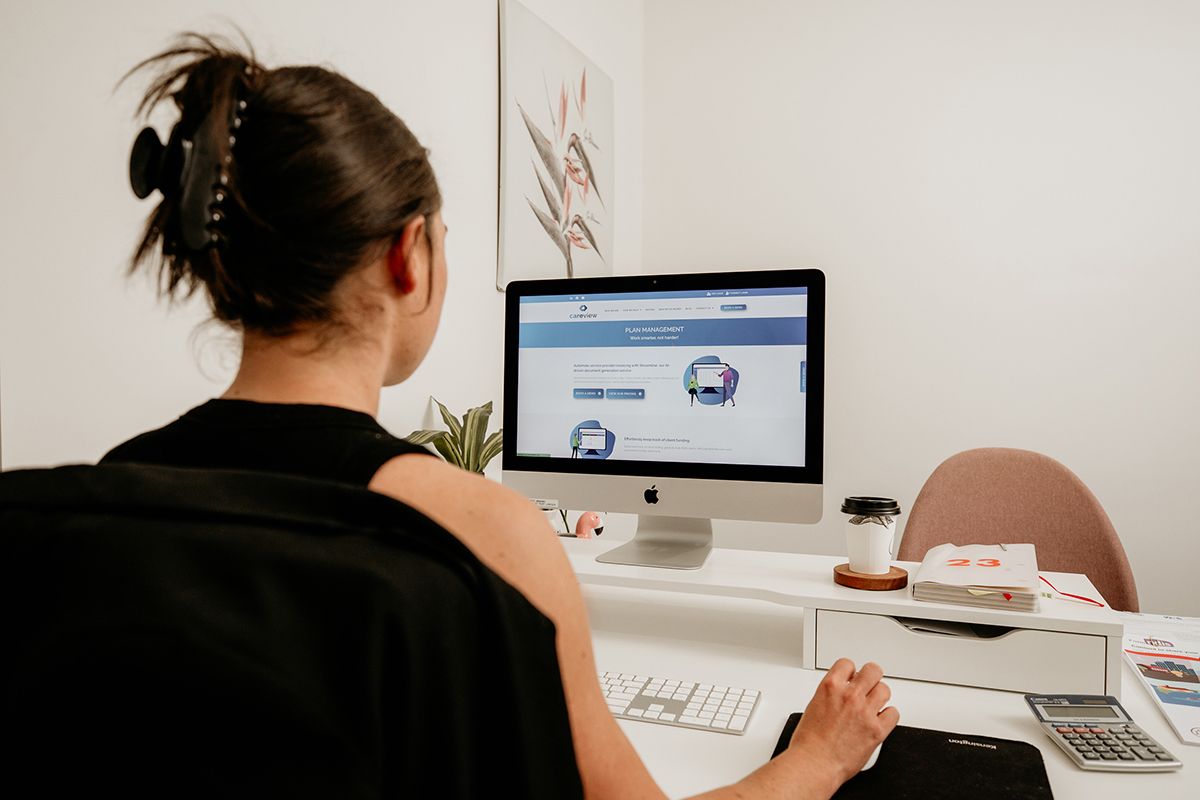a woman using the CareView portal