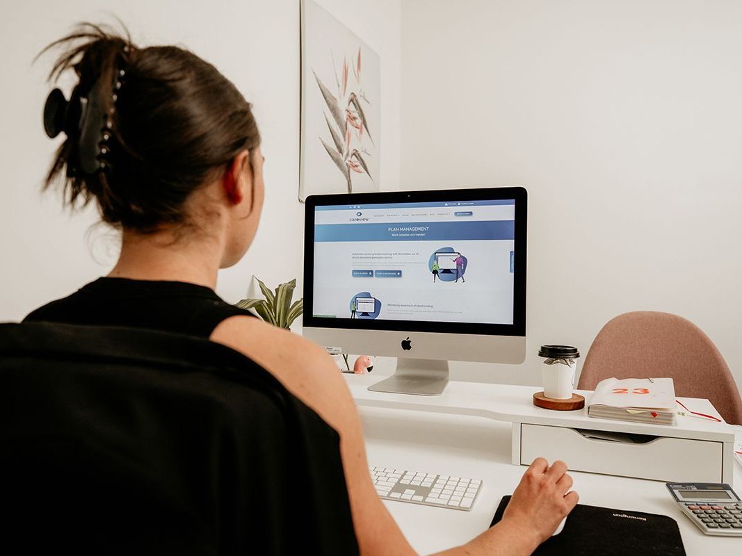 a woman using the CareView portal