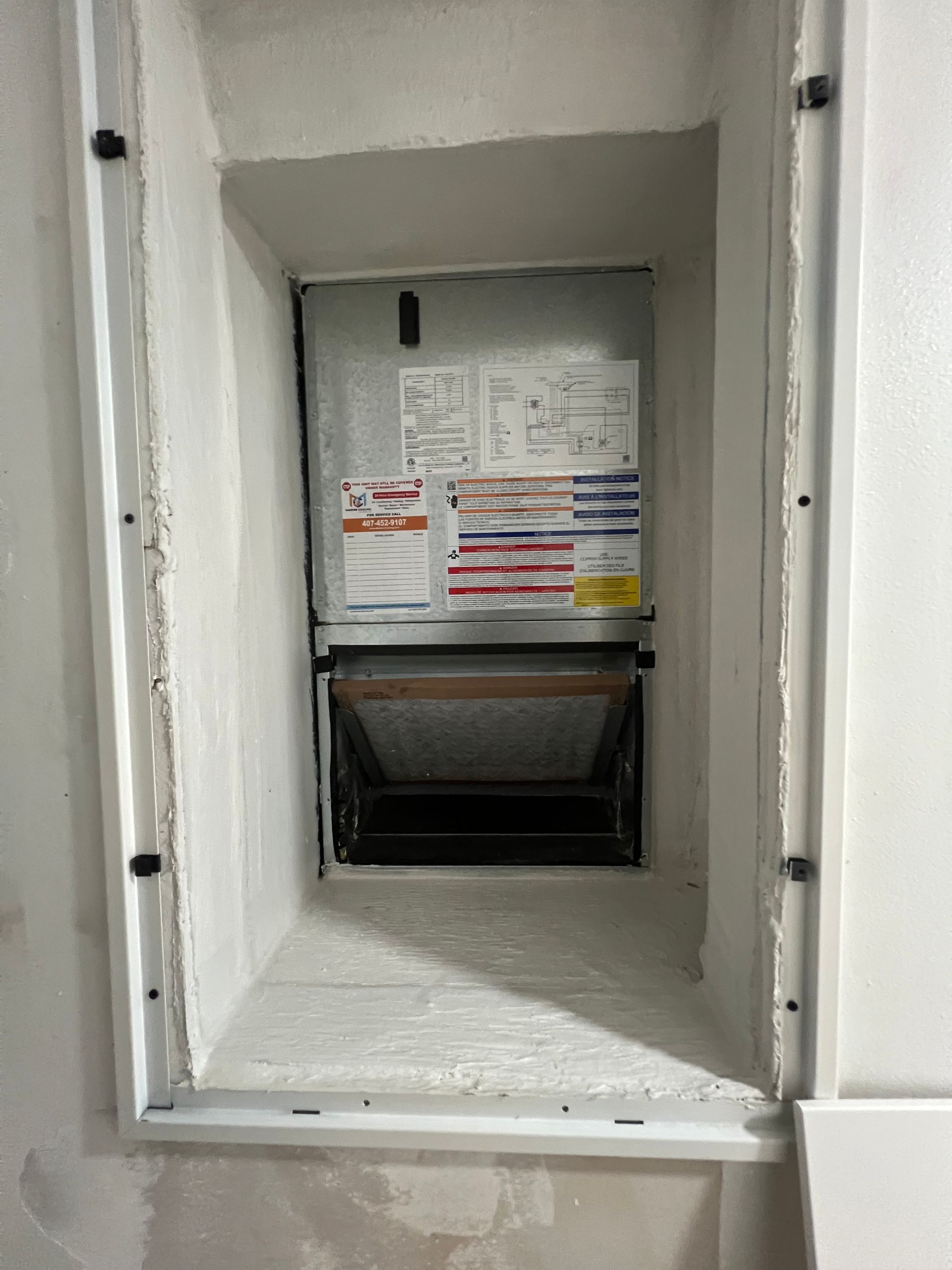 a picture of an air conditioner in a wall .