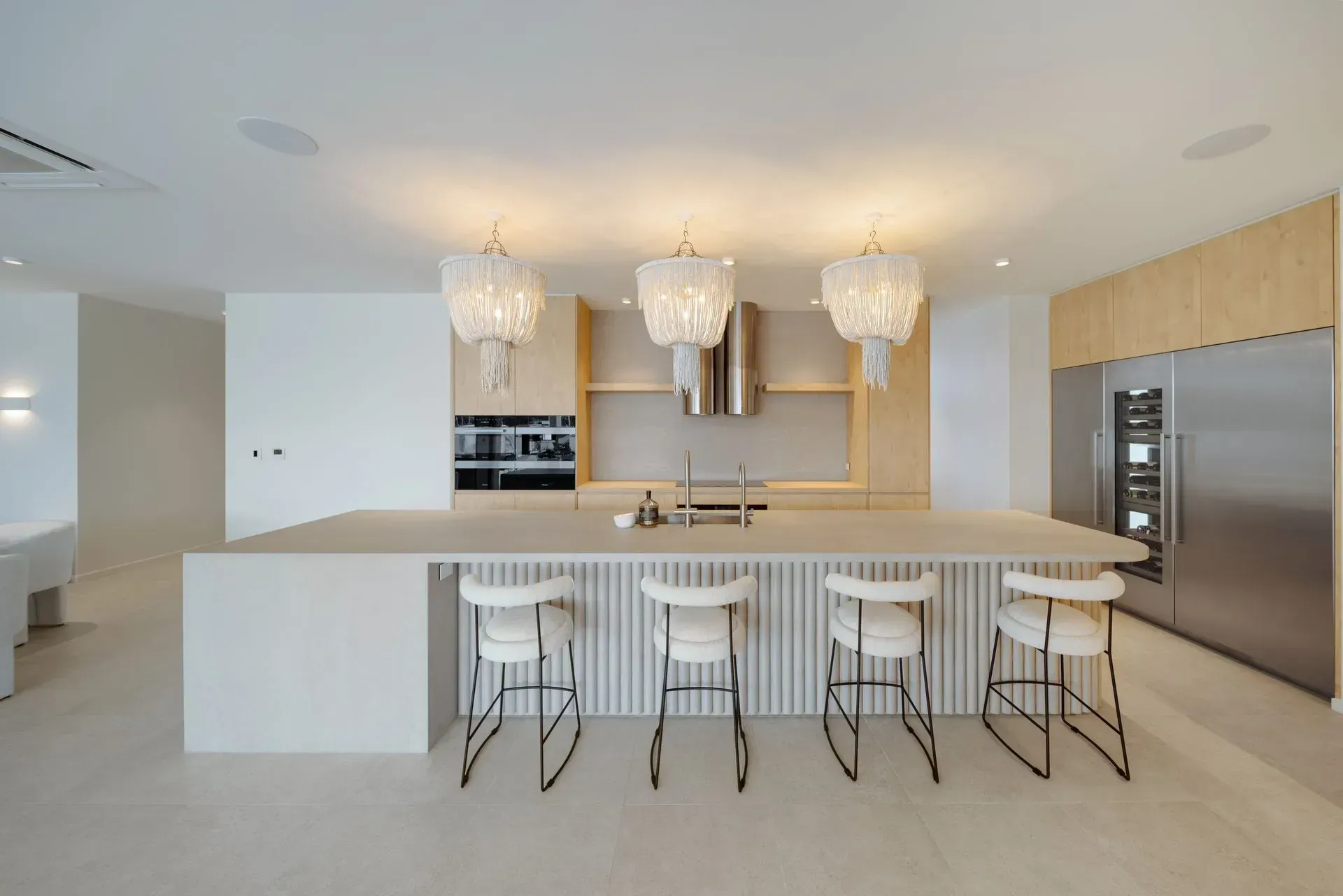 A Kitchen With A Large Island And Stools — Reynolds Built In Dicky Beach, QLD