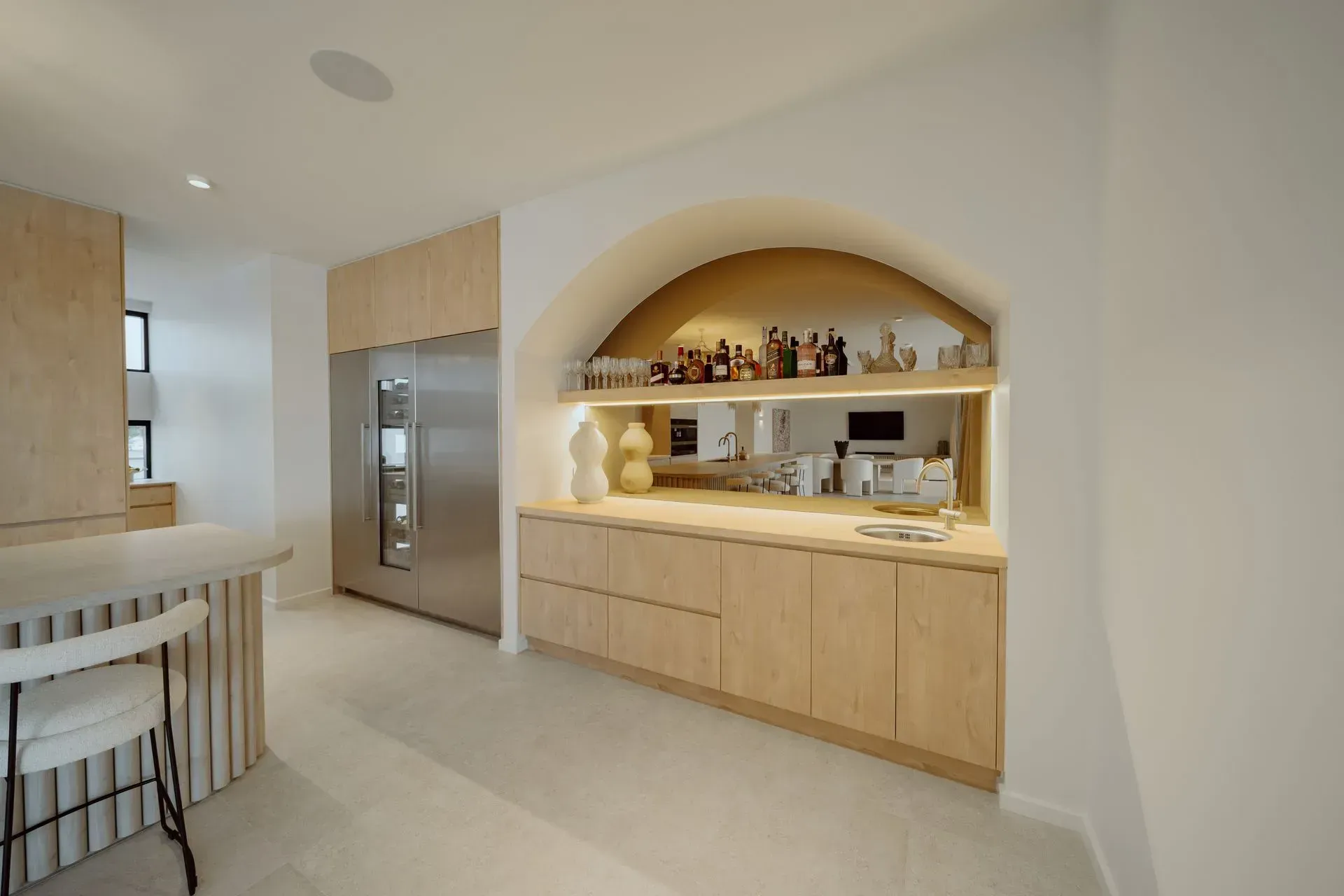 A Kitchen With Stainless Steel Appliances And Wooden Cabinets — Reynolds Built In Dicky Beach, QLD
