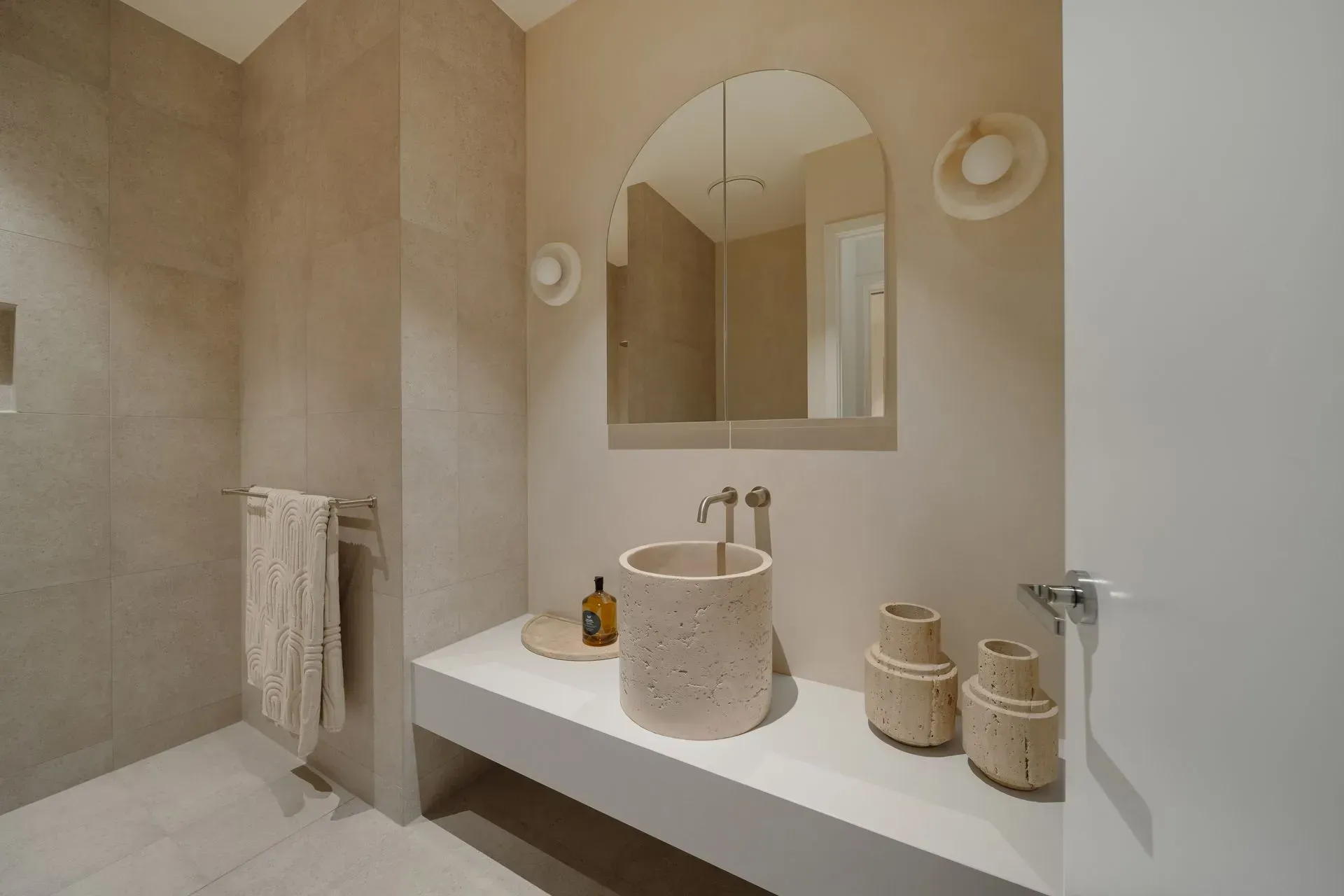 A Bathroom With A Sink, Mirror, And Towels — Reynolds Built In Dicky Beach, QLD