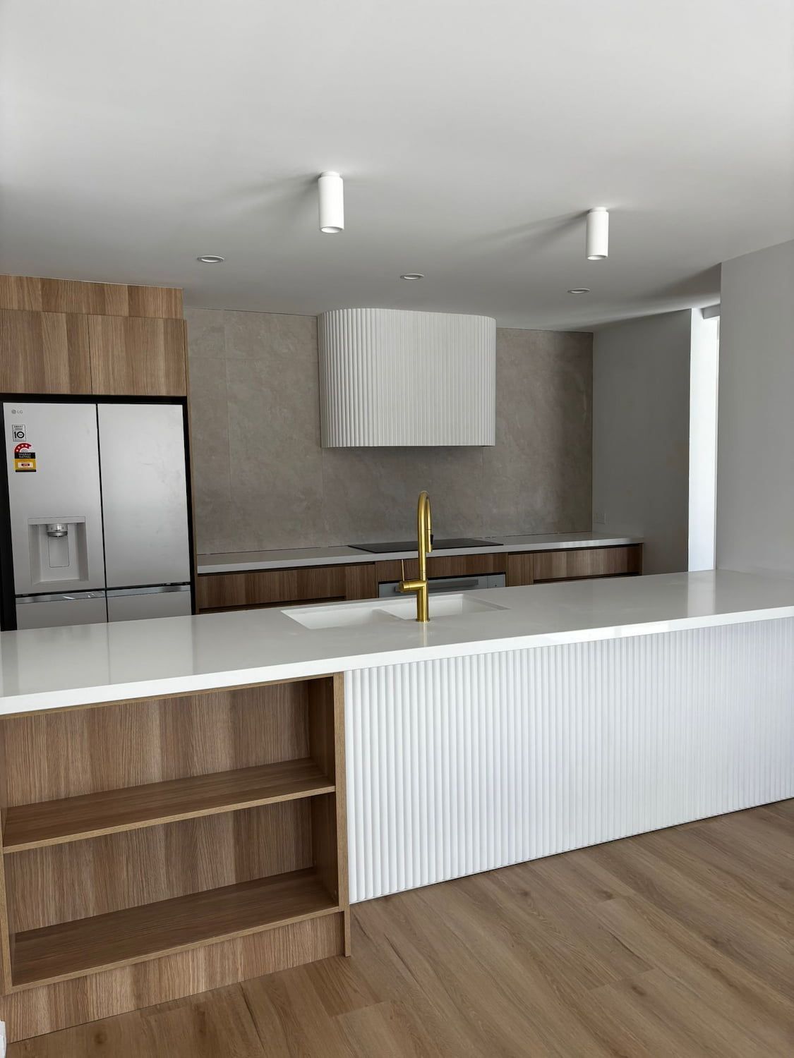 Modern Kitchen With White Countertops and Cabinets — Reynolds Built In Maroochydore, QLD
