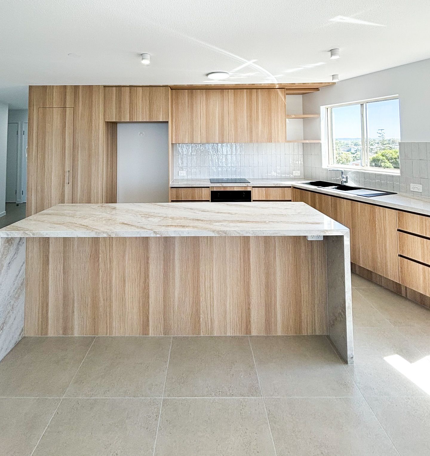 Modern Kitchen With Light Wood Cabinets — Reynolds Built In Dicky Beach, QLD