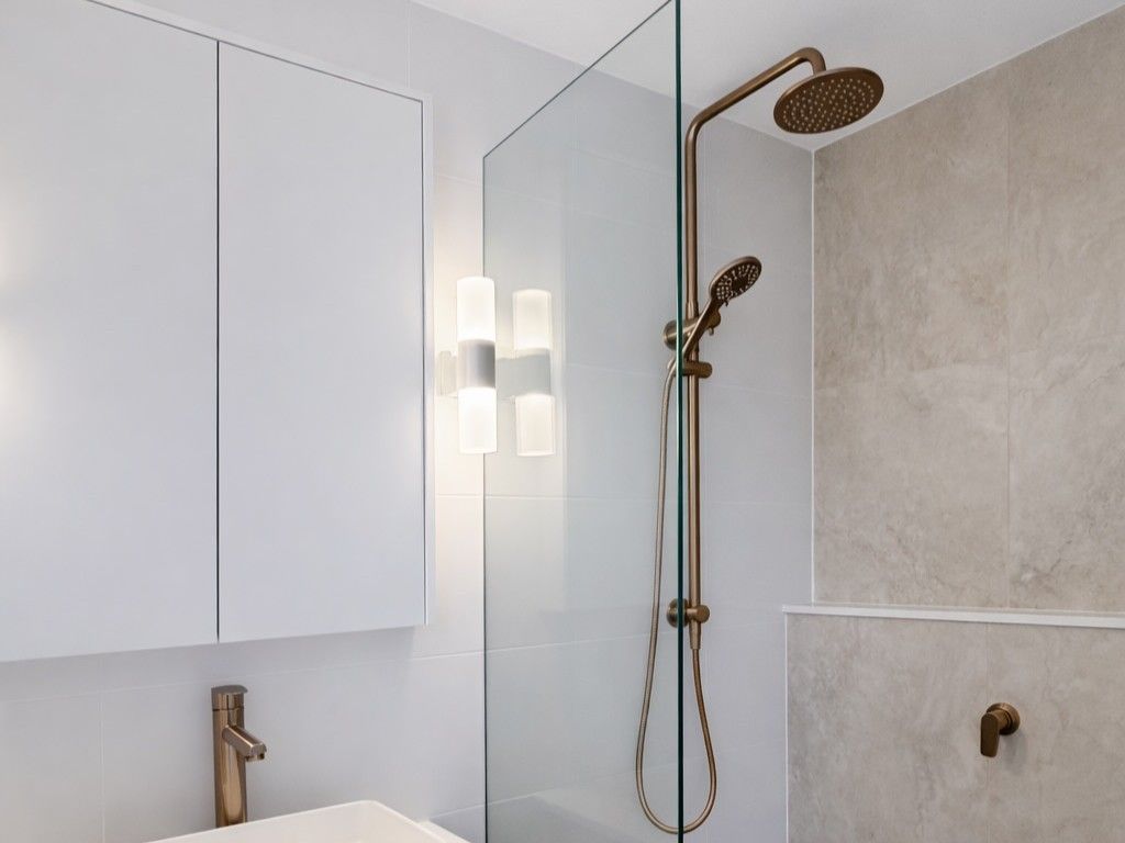 A Newly Renovated Bathroom With Shower