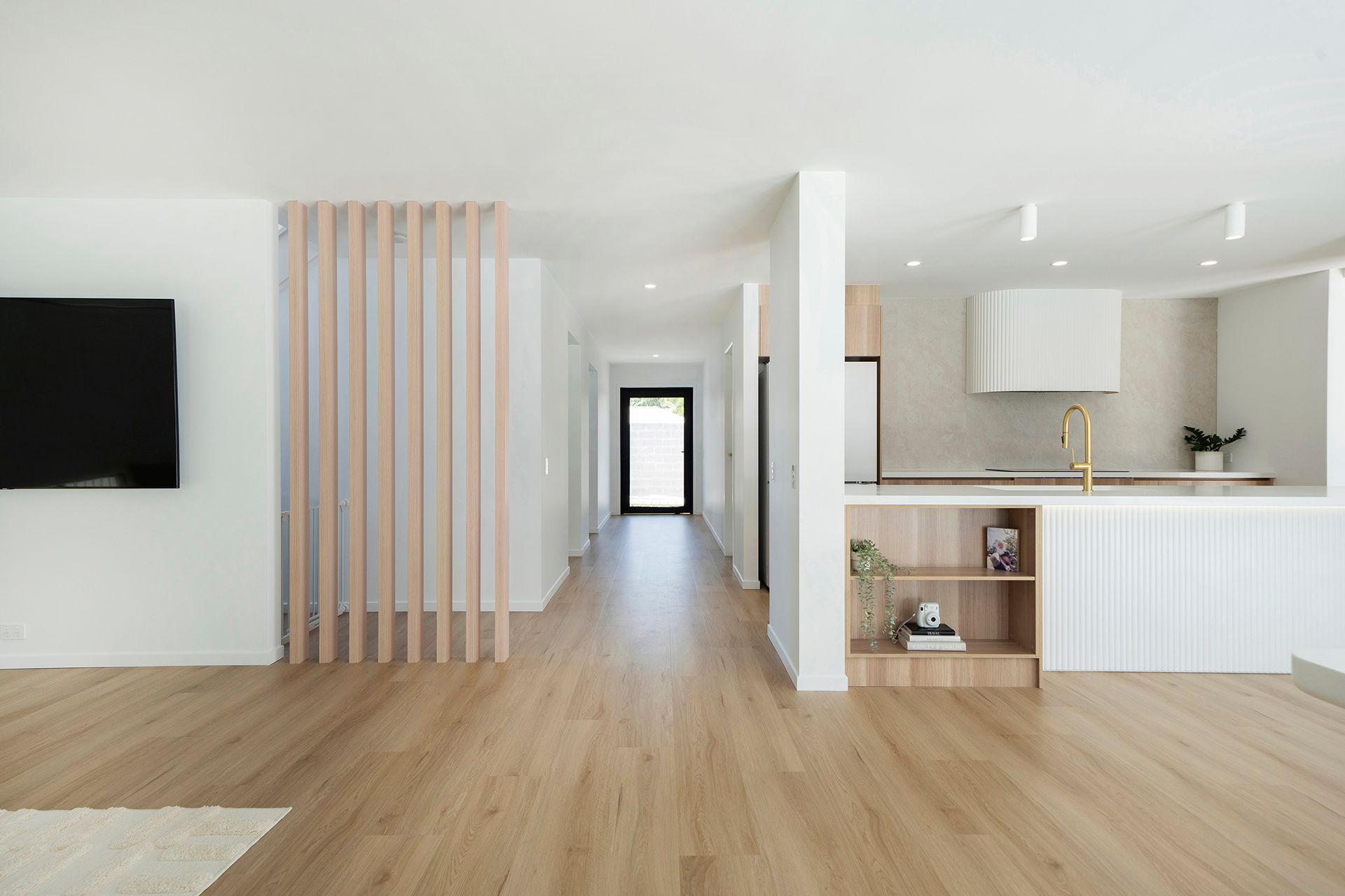 A Kitchen With Wooden Cabinets And White Counter Tops — Reynolds Built In Moffat Beach, QLD