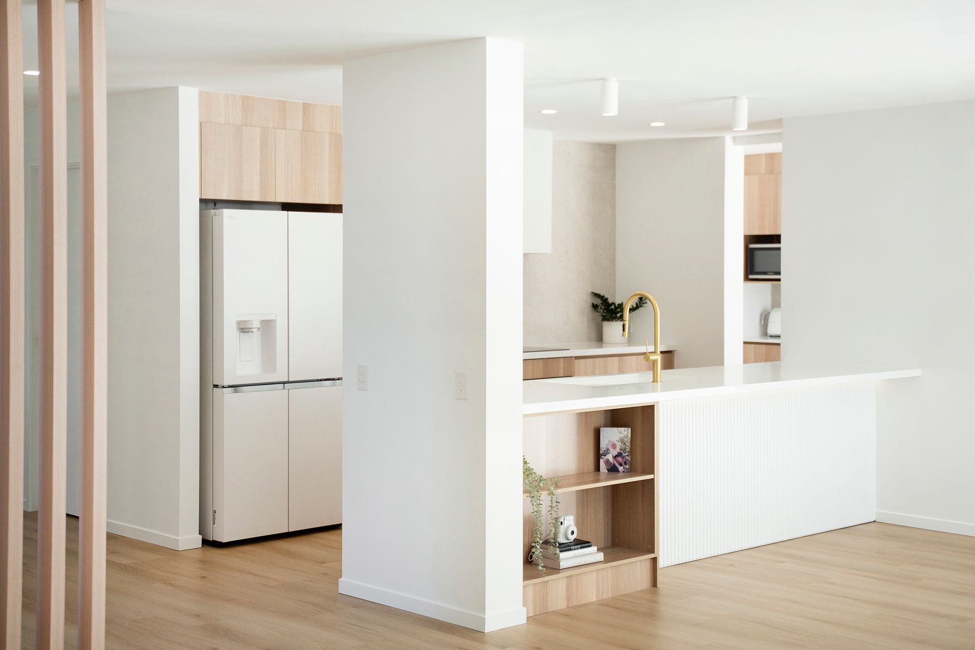 A Hallway With A Desk And A Chair In It — Reynolds Built In Caloundra, QLD