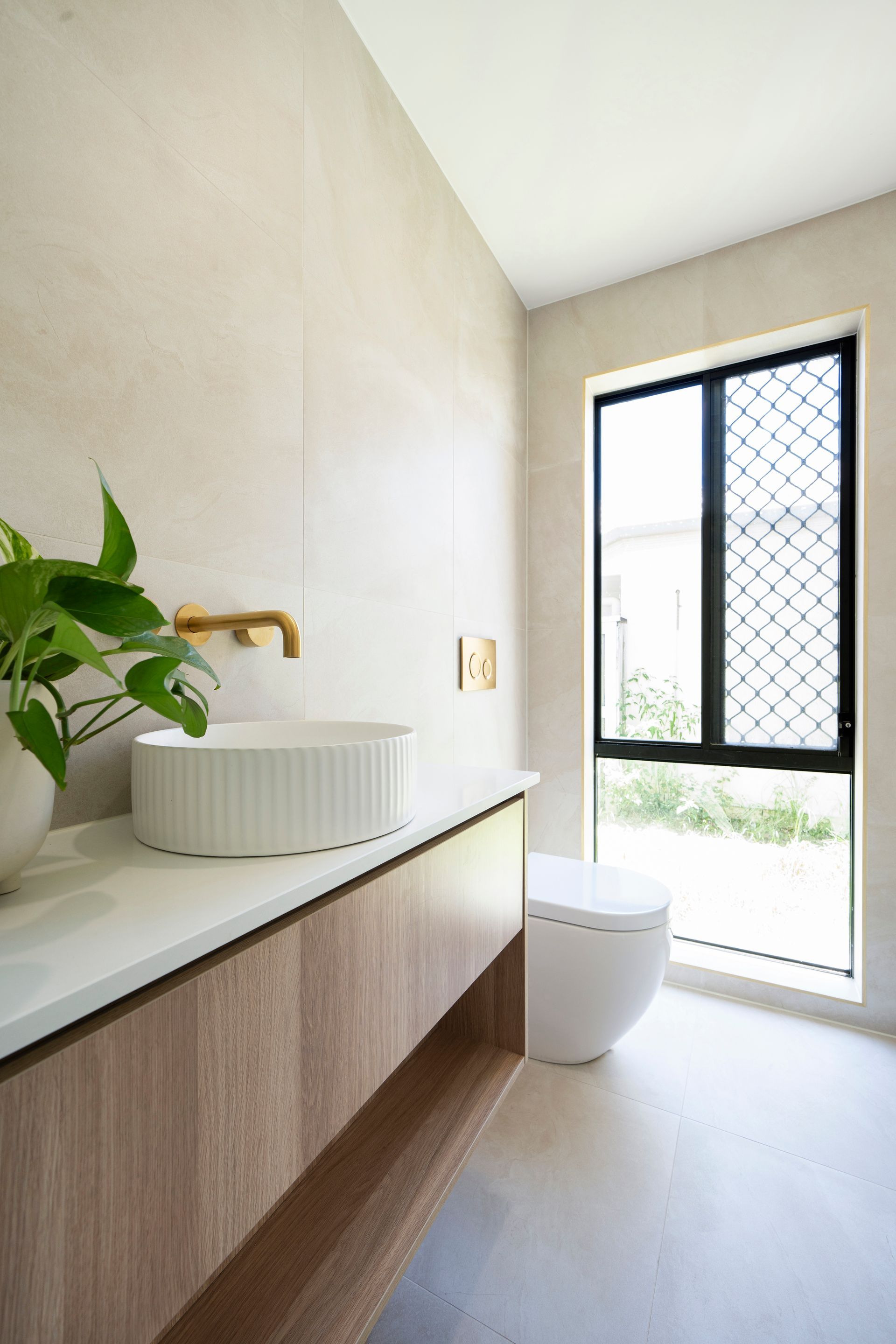 Modern Bathroom With a Floating Wooden Vanity — Reynolds Built In Dicky Beach, QLD