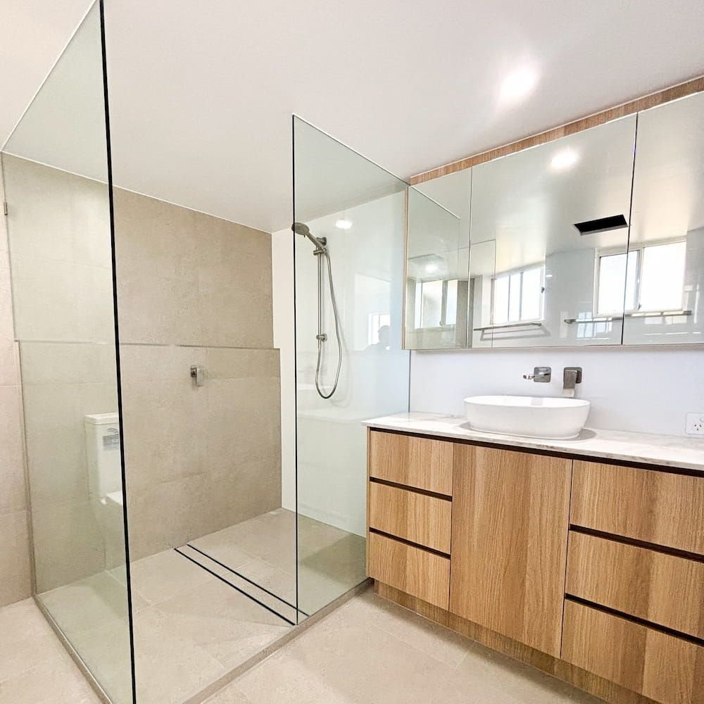 Modern Bathroom With a Glass-enclosed Shower — Reynolds Built In Caloundra, QLD
