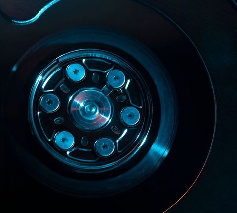 Close-up of a precision automotive hub or brake assembly.