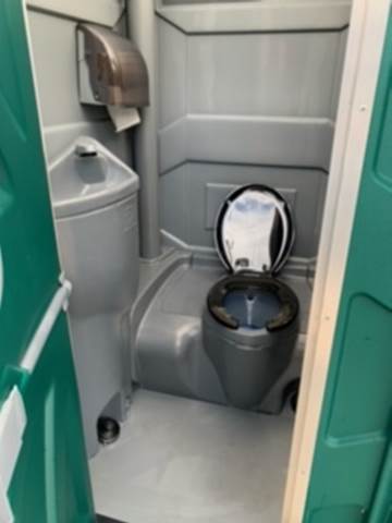 Flushable Unit with Sink — Portable Toilet on Park in Tampa Bay, FL