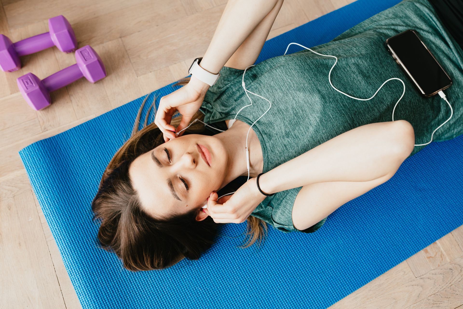 Indoor Working Out Listening to Phone