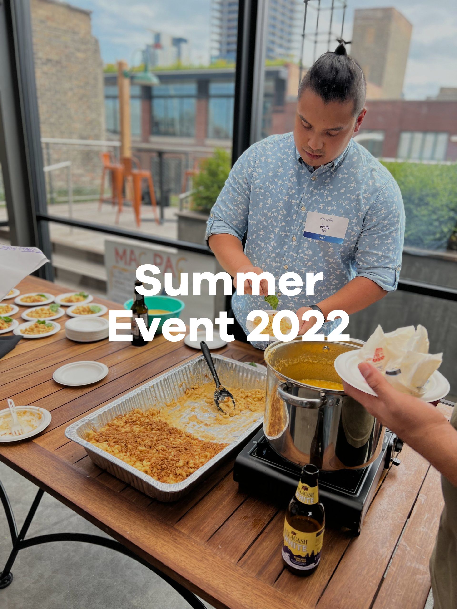 A man is preparing food at a summer event in 2022.