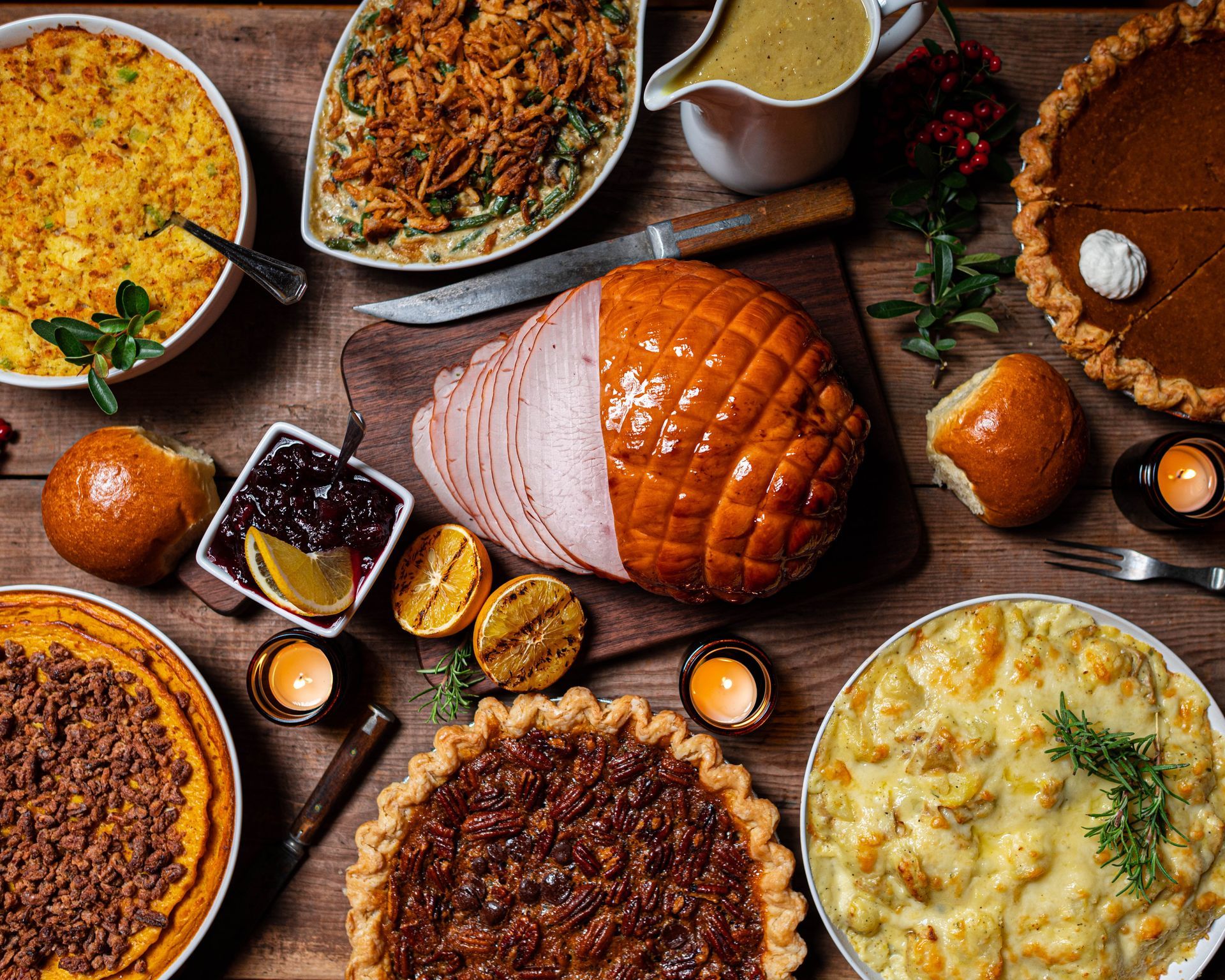 There are many different types of food on the table for thanksgiving.