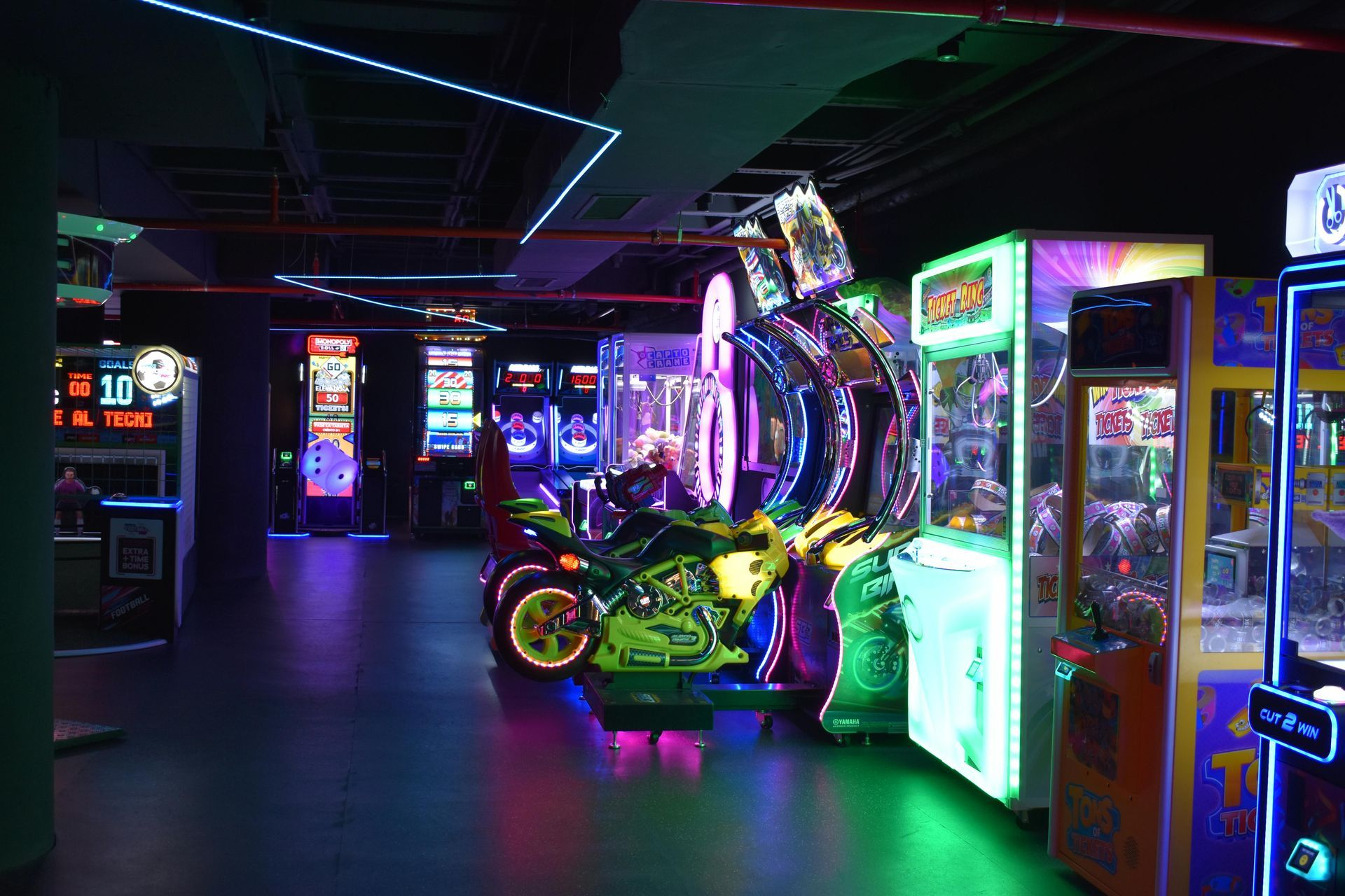 A vibrant, colorful arcade filled with games and lights.