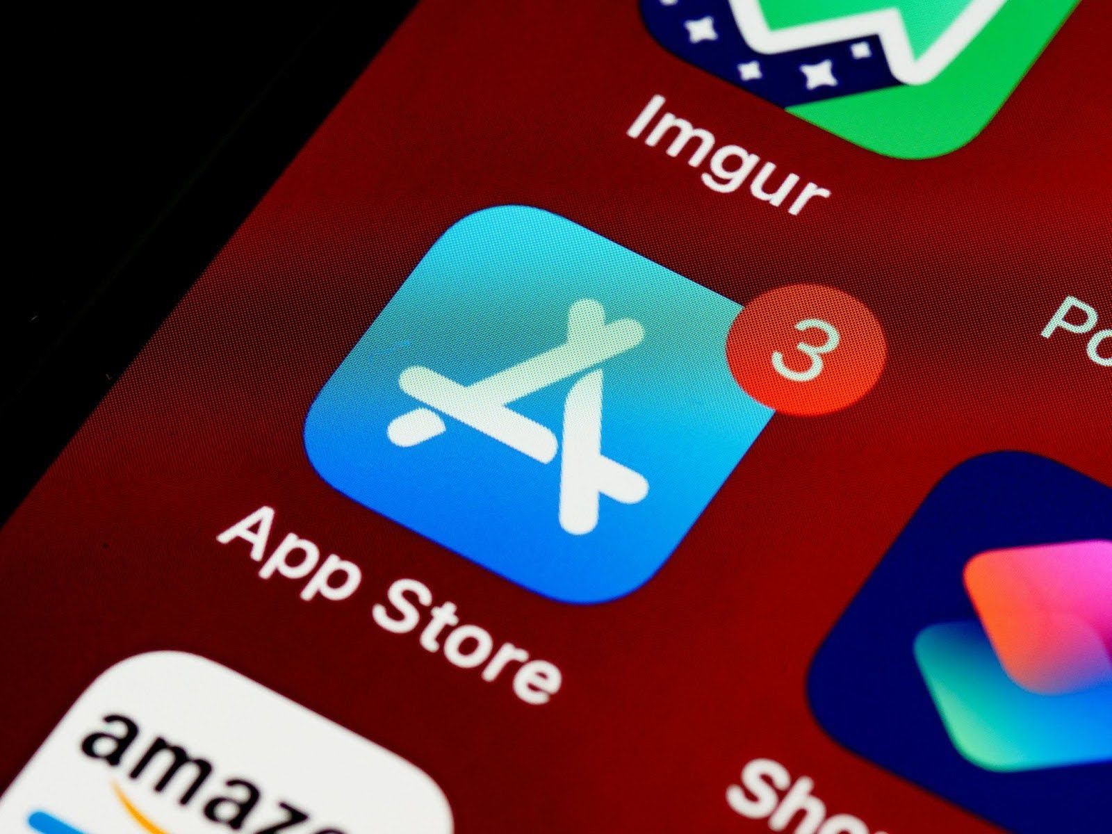 A close up of the app store icon on a phone