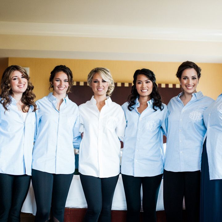 A group of women are posing for a picture together