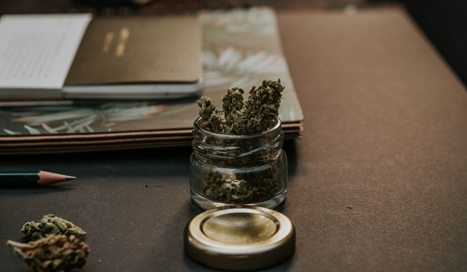 Marijuana in Jar on Desk
