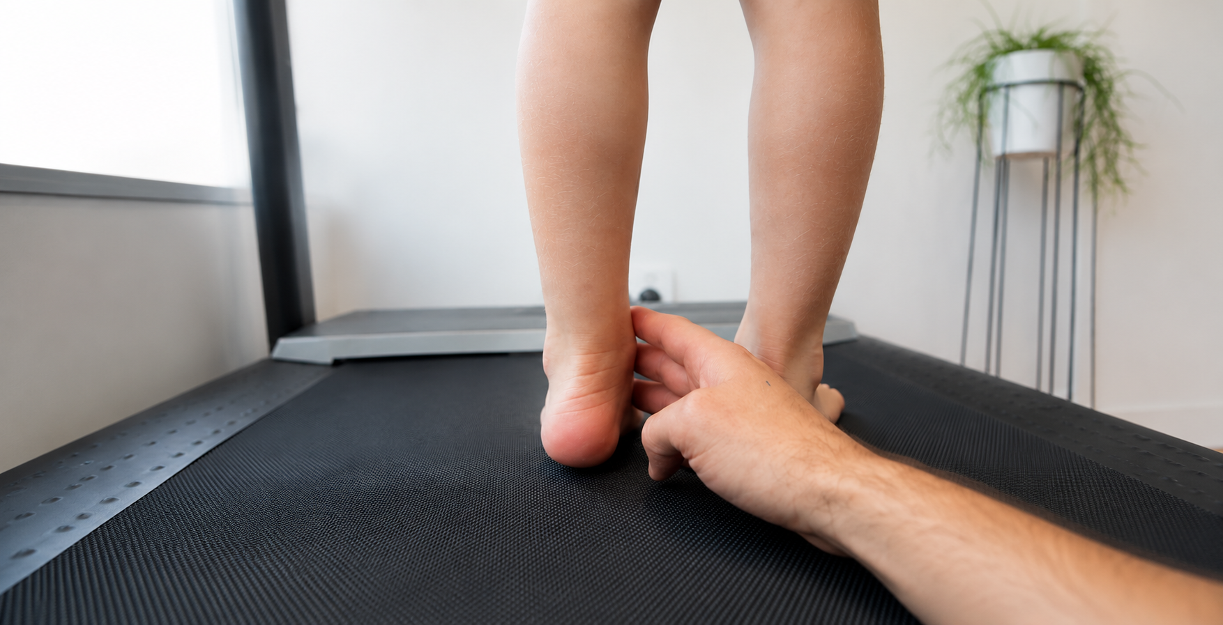 Hands Examining a Child's Foot. Close-up — Biomedical Sports Podiatry in Forster, NSW