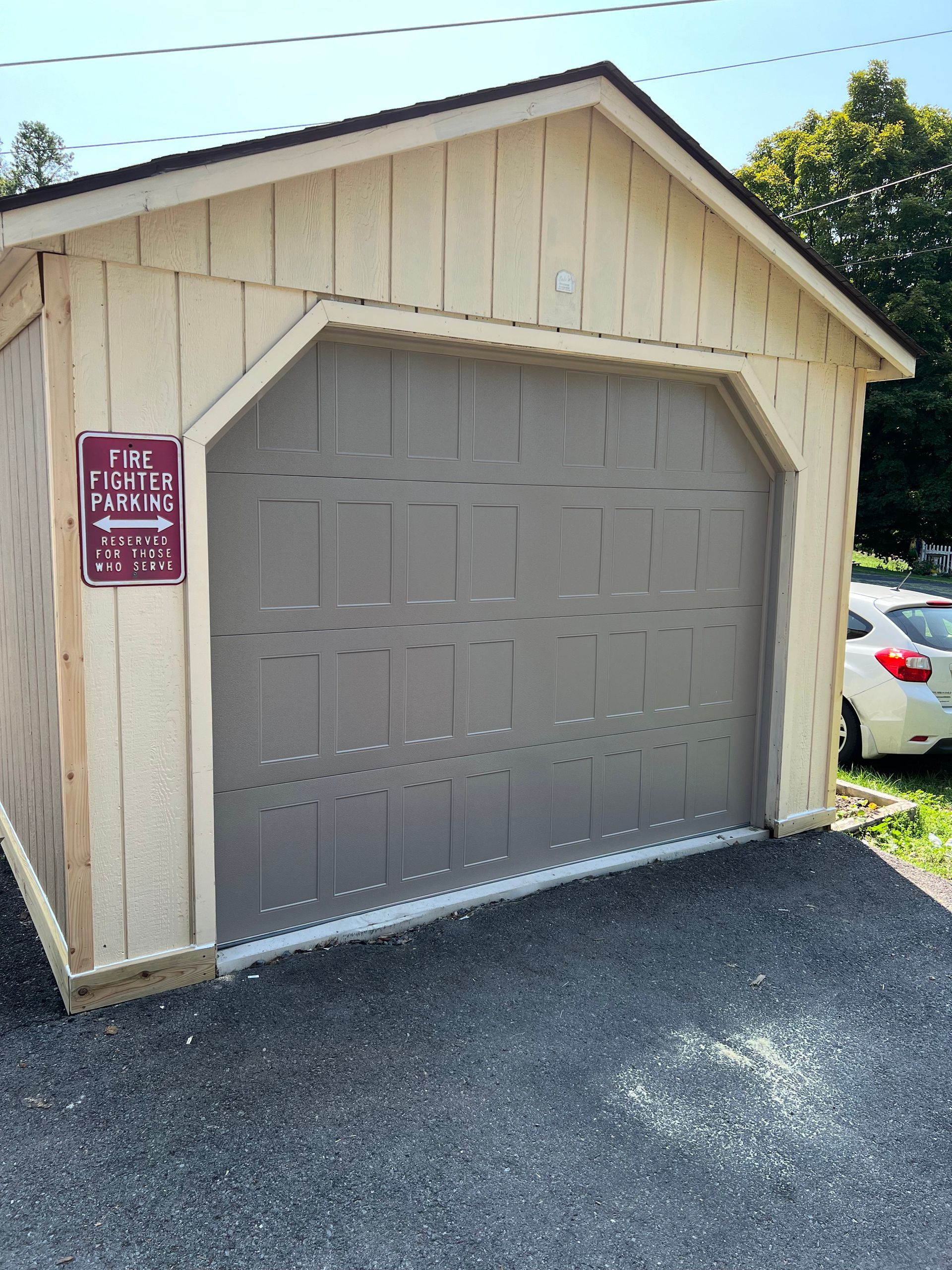 A garage with a sign that says fire hydrant portable