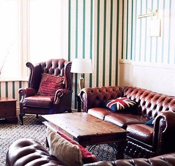 Brown leather sofa set in the dining room