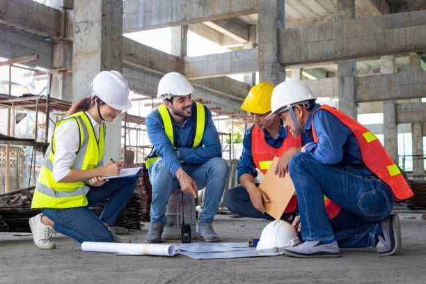 Team from Control Services Inc., revising and improving the plans of a commercial building maintenance service in Kearney, NE.