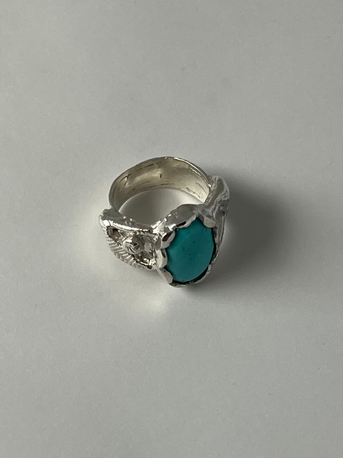 Custom jewelry design with Wild Sunflower Silver. Kingman Turquoise custom ring.