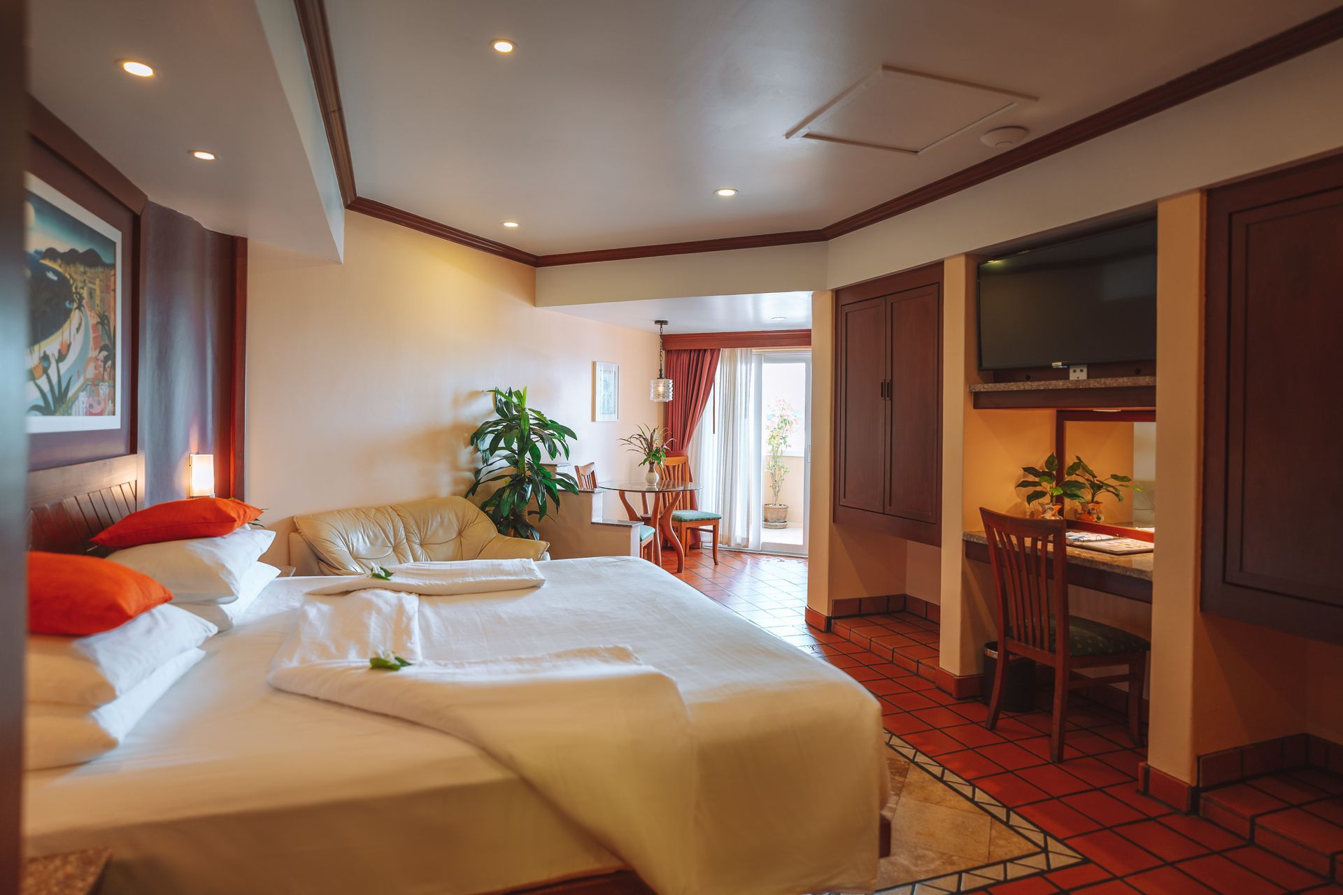 There is a large bed in the middle of the room.