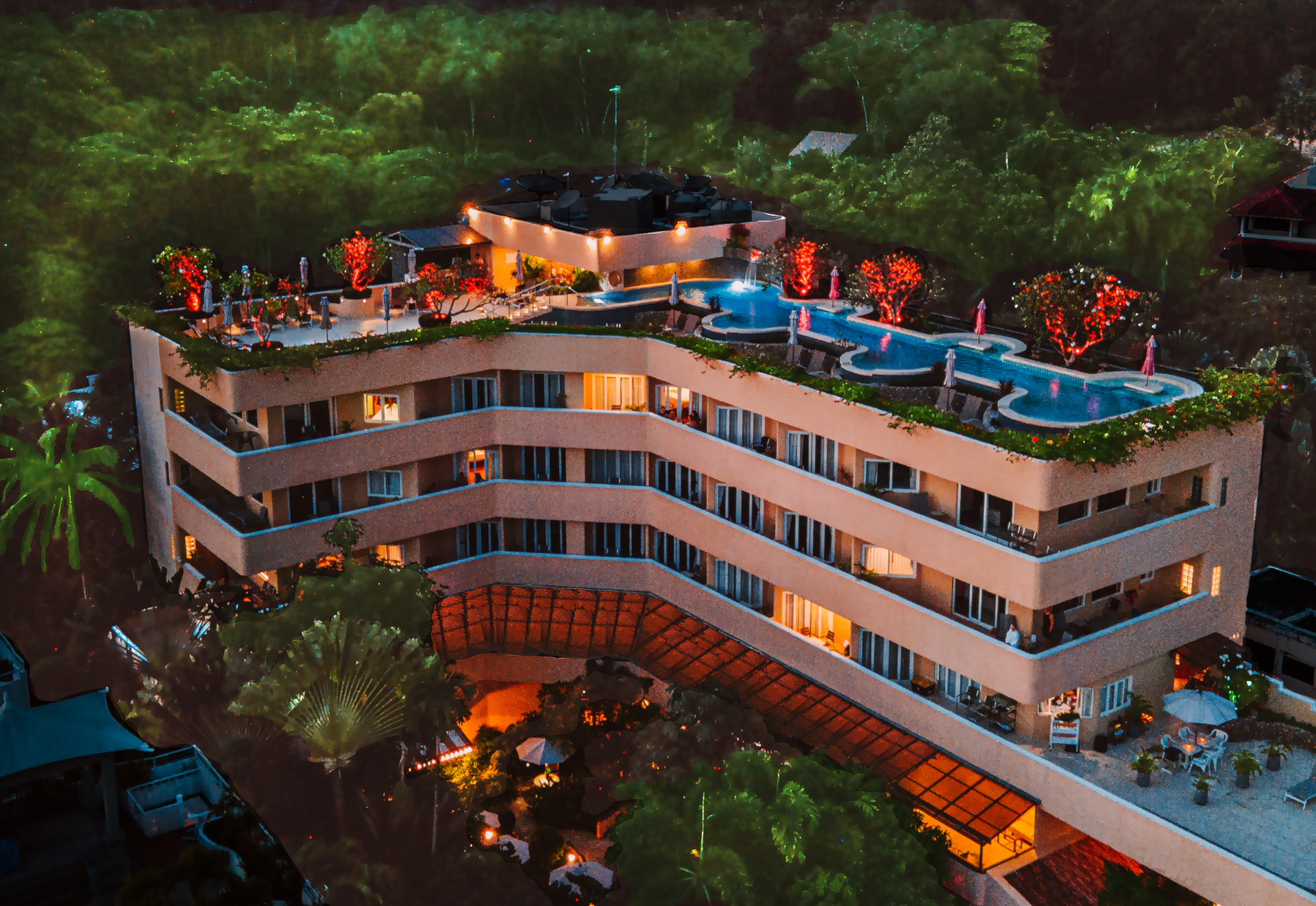 An aerial view of a large building with a pool on top of it