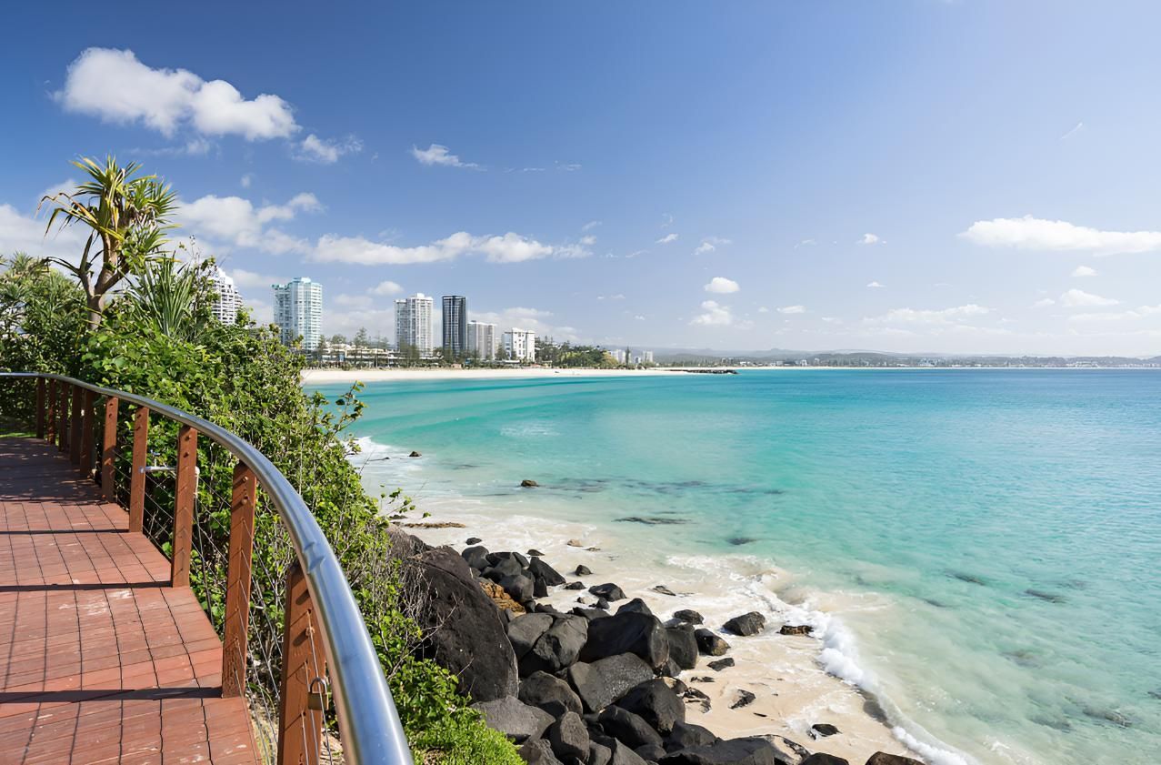 Wooden Walkway Leading to a Beach — Hager Surveying In Coolangatta, QLD