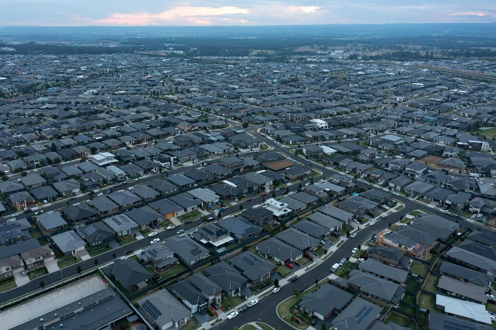 An Aerial View of A Residential Area with Lots of Houses — Hager Surveying In Banora Point, NSW