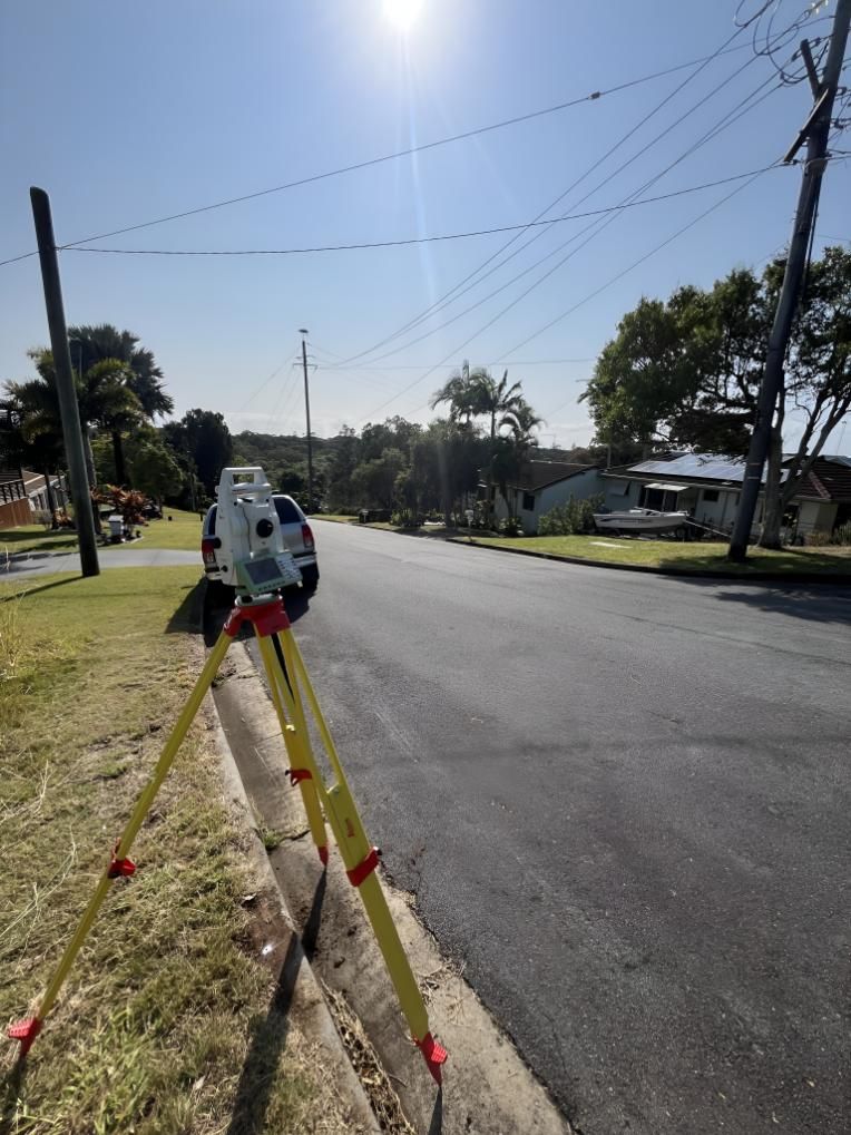 Road With a Tripod — Hager Surveying In Coolangatta, QLD