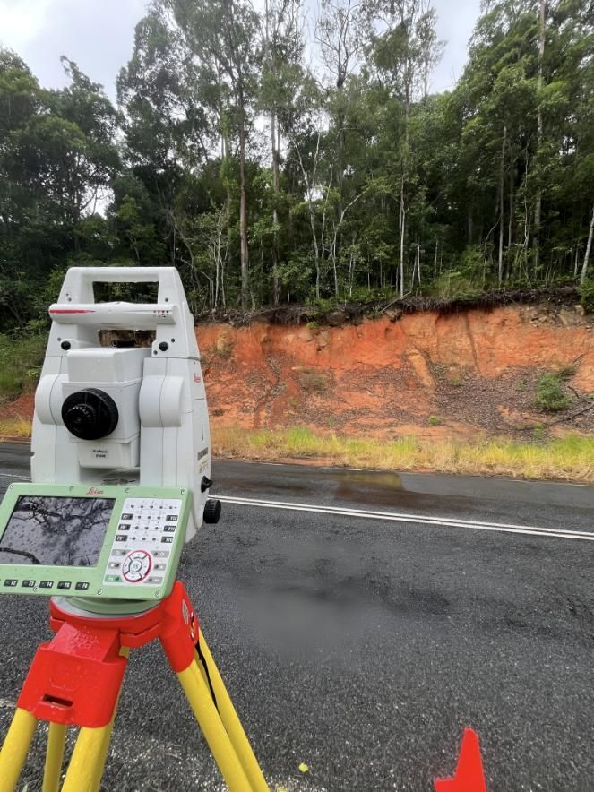 Tripod on the Side of a Road — Hager Surveying In Northern Rivers, NSW