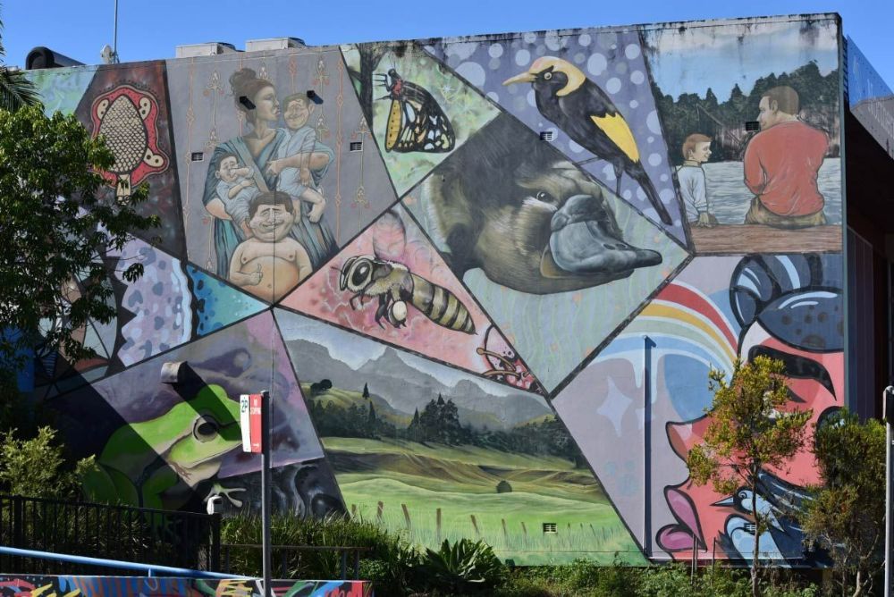 A Large Colourful Mural on The Side of A Building — Hager Surveying In Lismore, NSW