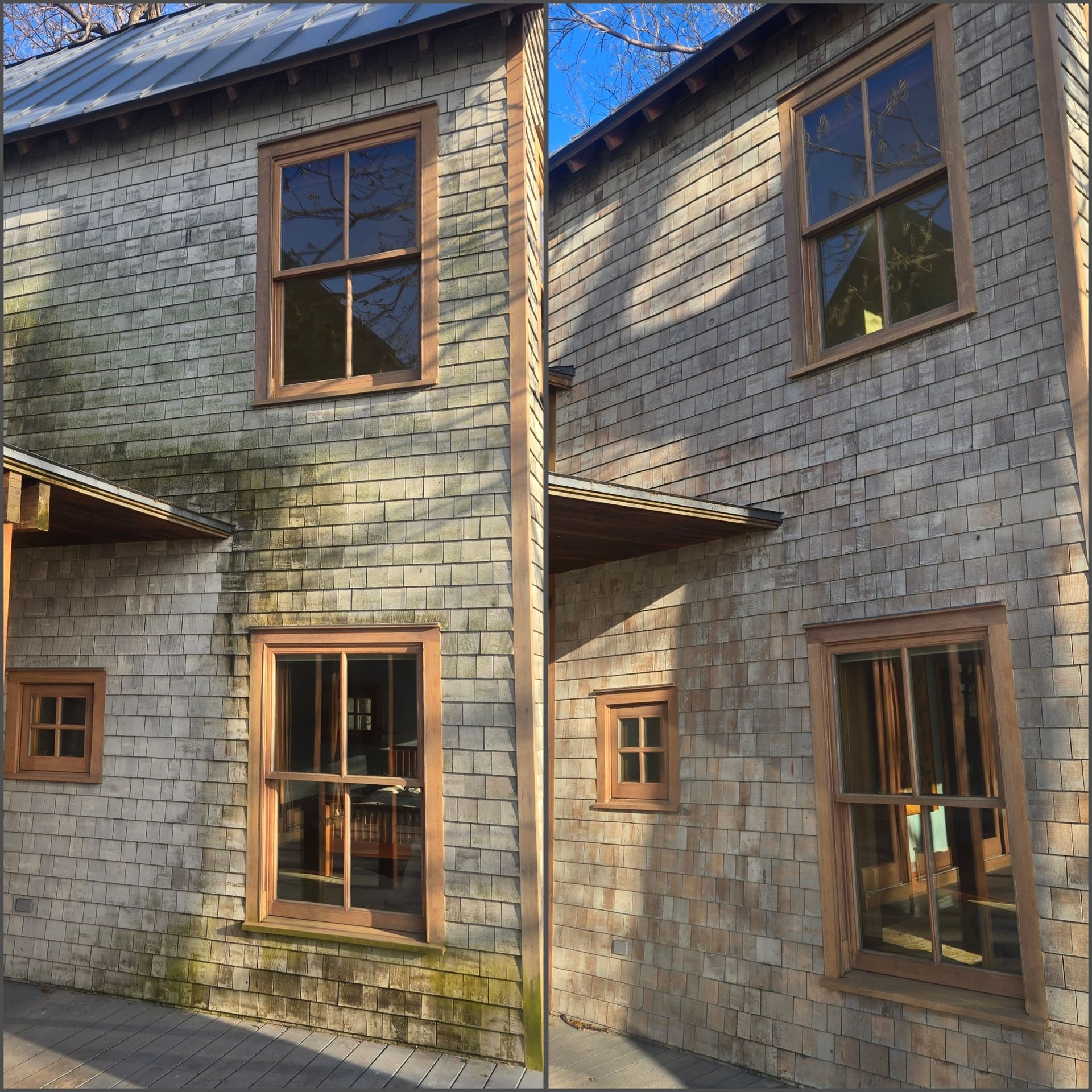 Two-story wooden building with light brown trim and windows. One side shows moss. Sunny day.