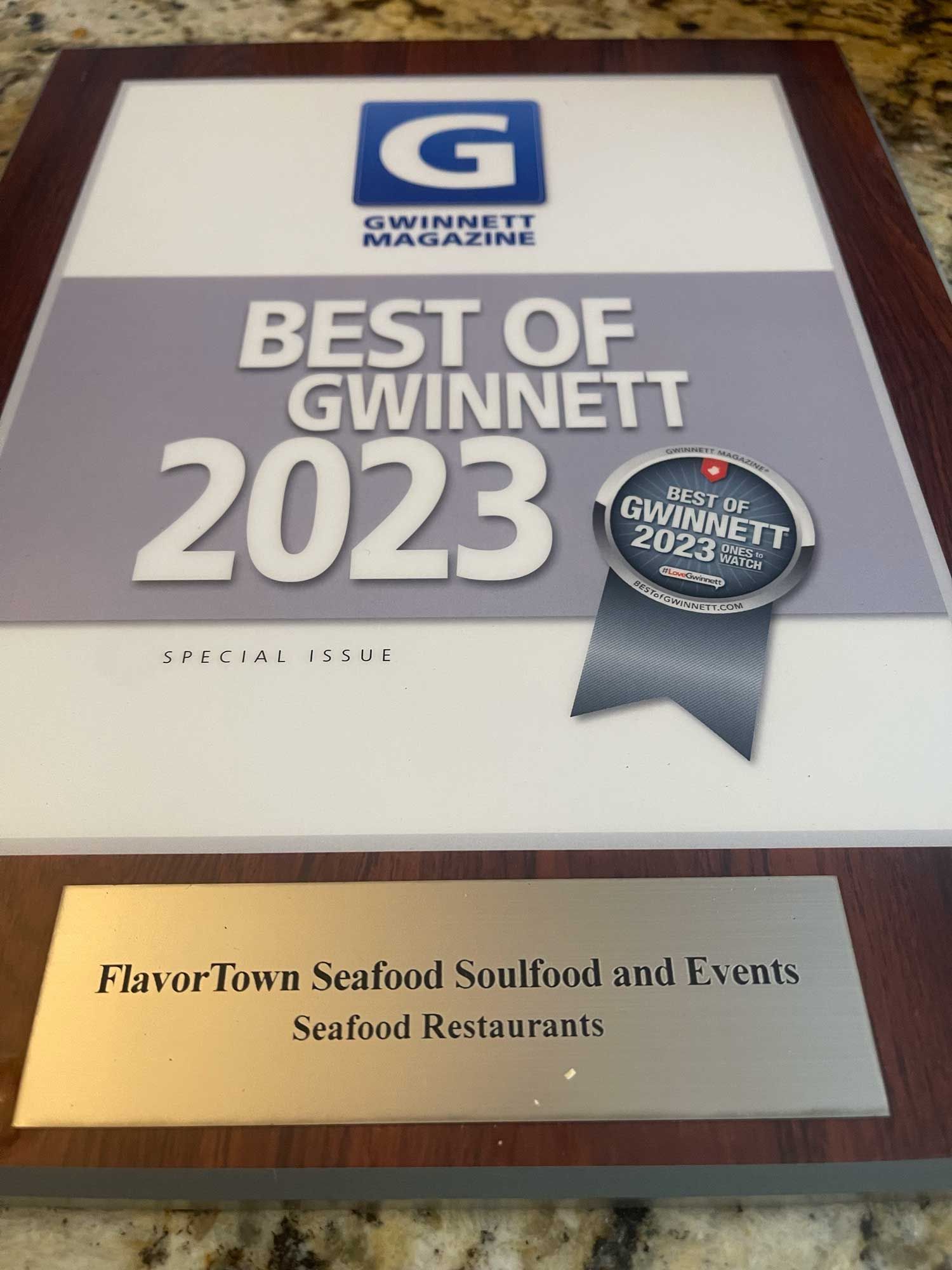 A plaque that says best of gwinnett 2023