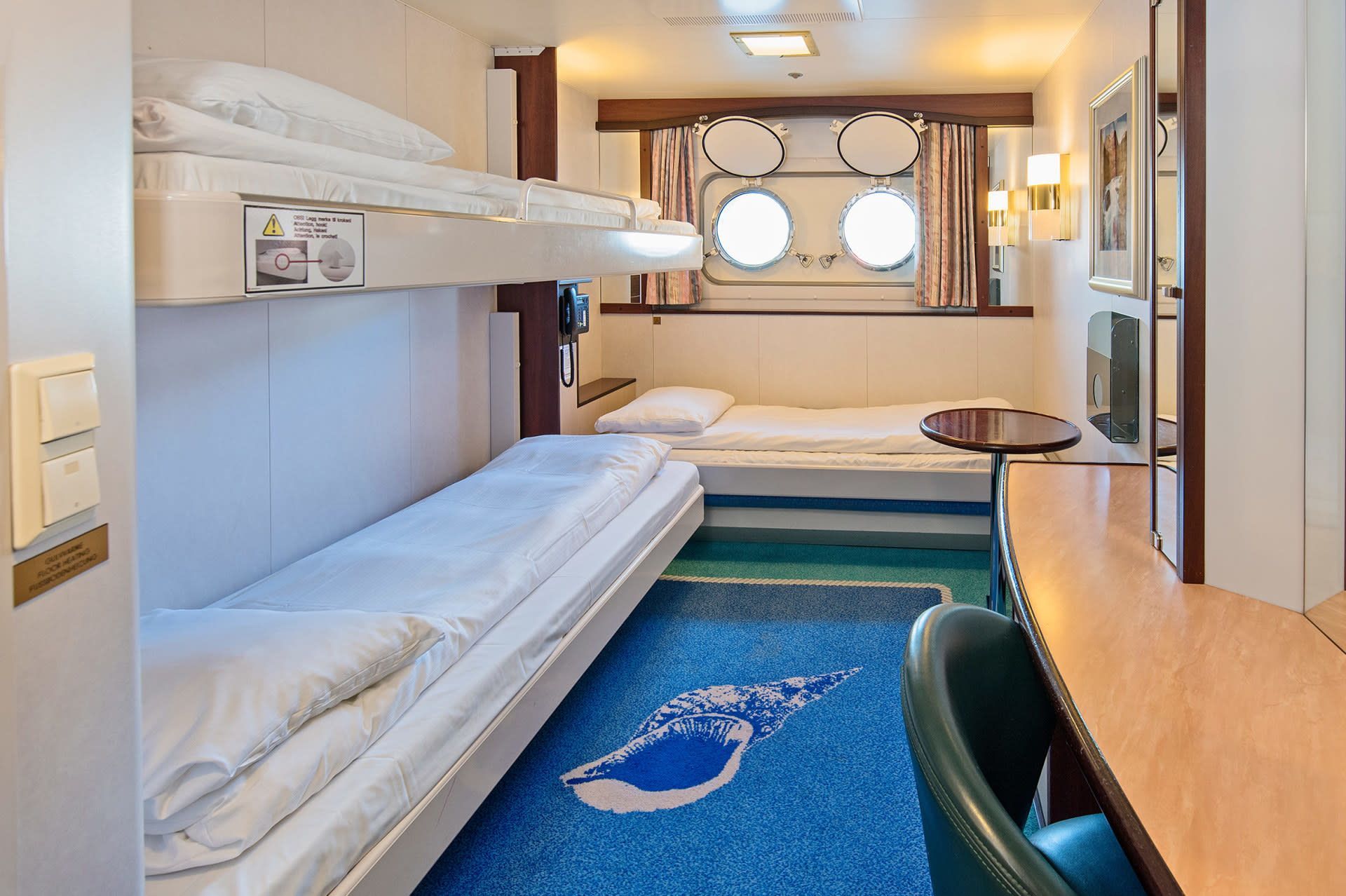 Opgemaakte bedden van cabin L3 op de MS Polarlys